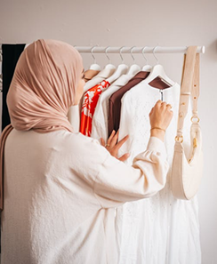 Woman touching clothes